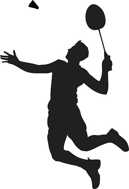 Badminton player smashing a shuttle.